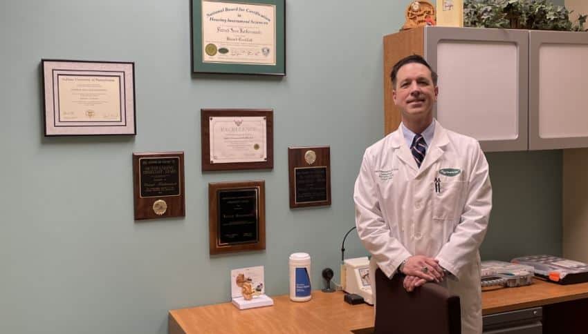 Patrick Kochanowski, BS, ACA, BC-HIS in his office