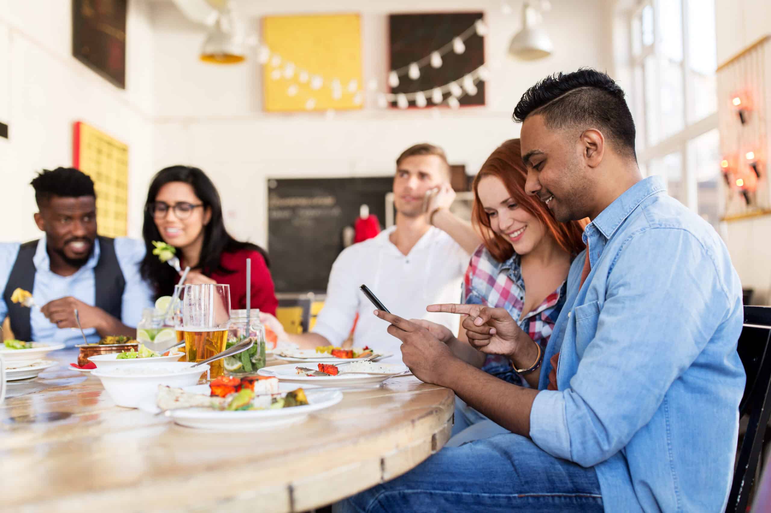 people sitting in a noisy restaurant