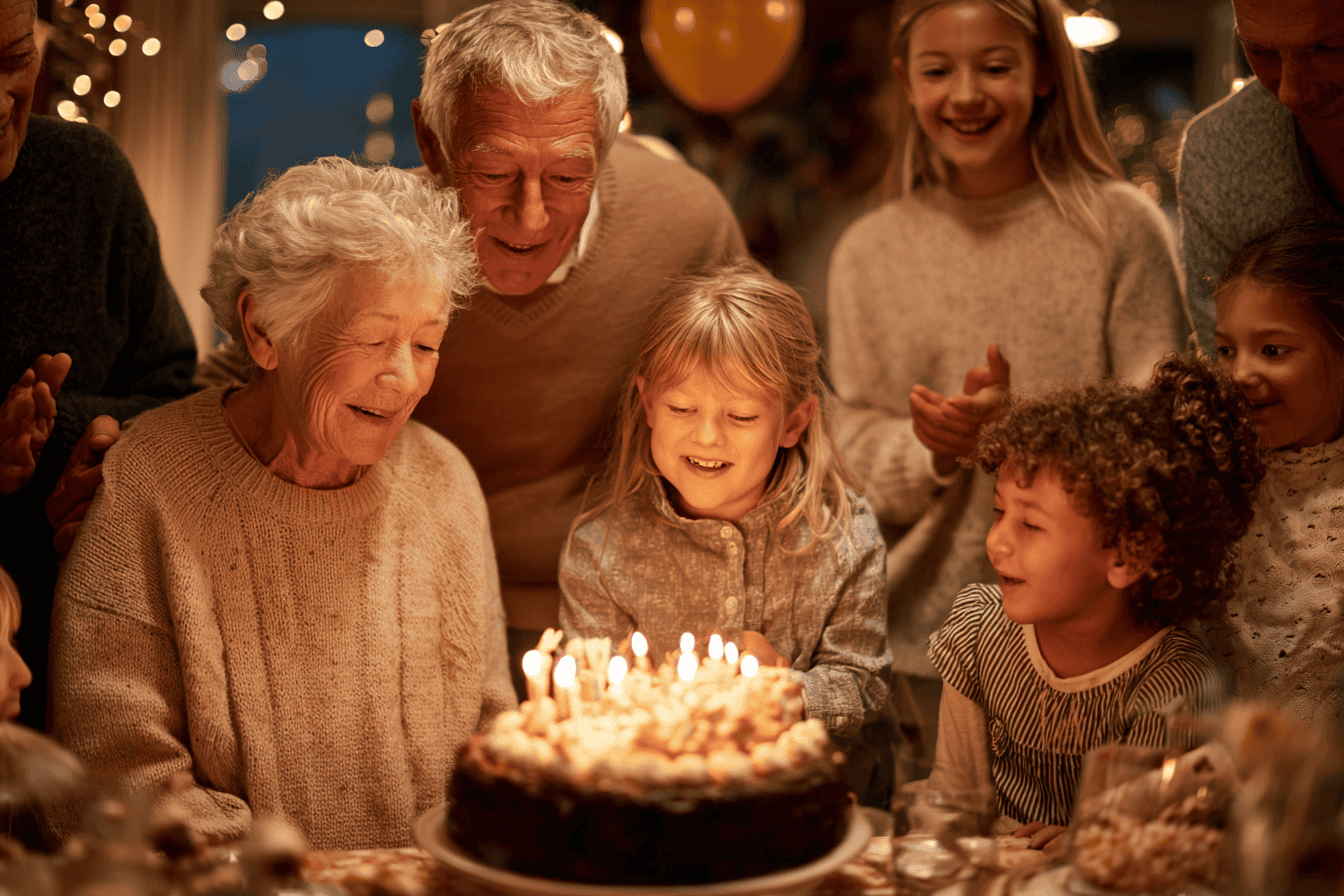 a family singing happy birthday around a cake with candles