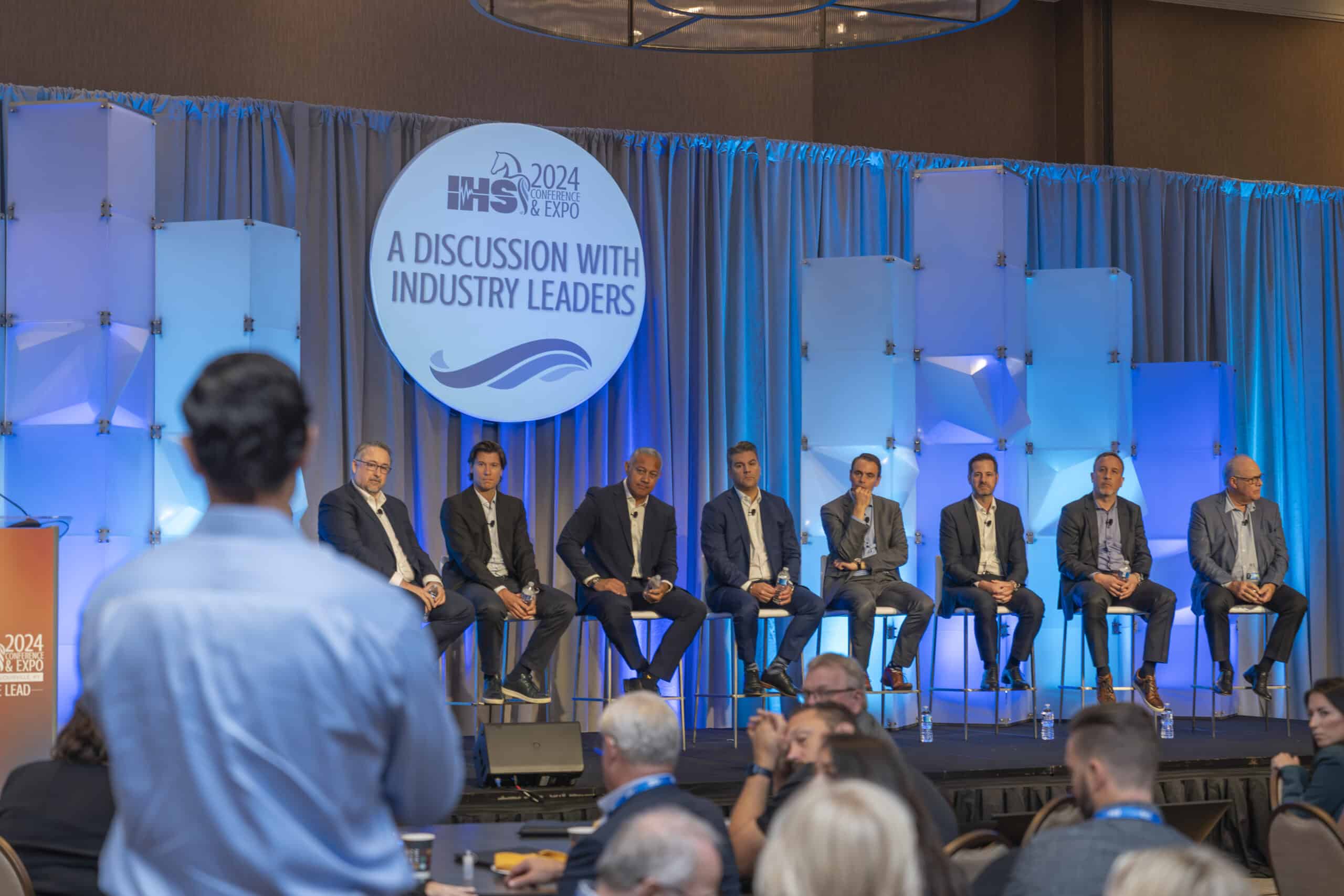 Attendee asking a question to the Industry Leader Panel at the IHS Conference & Expo