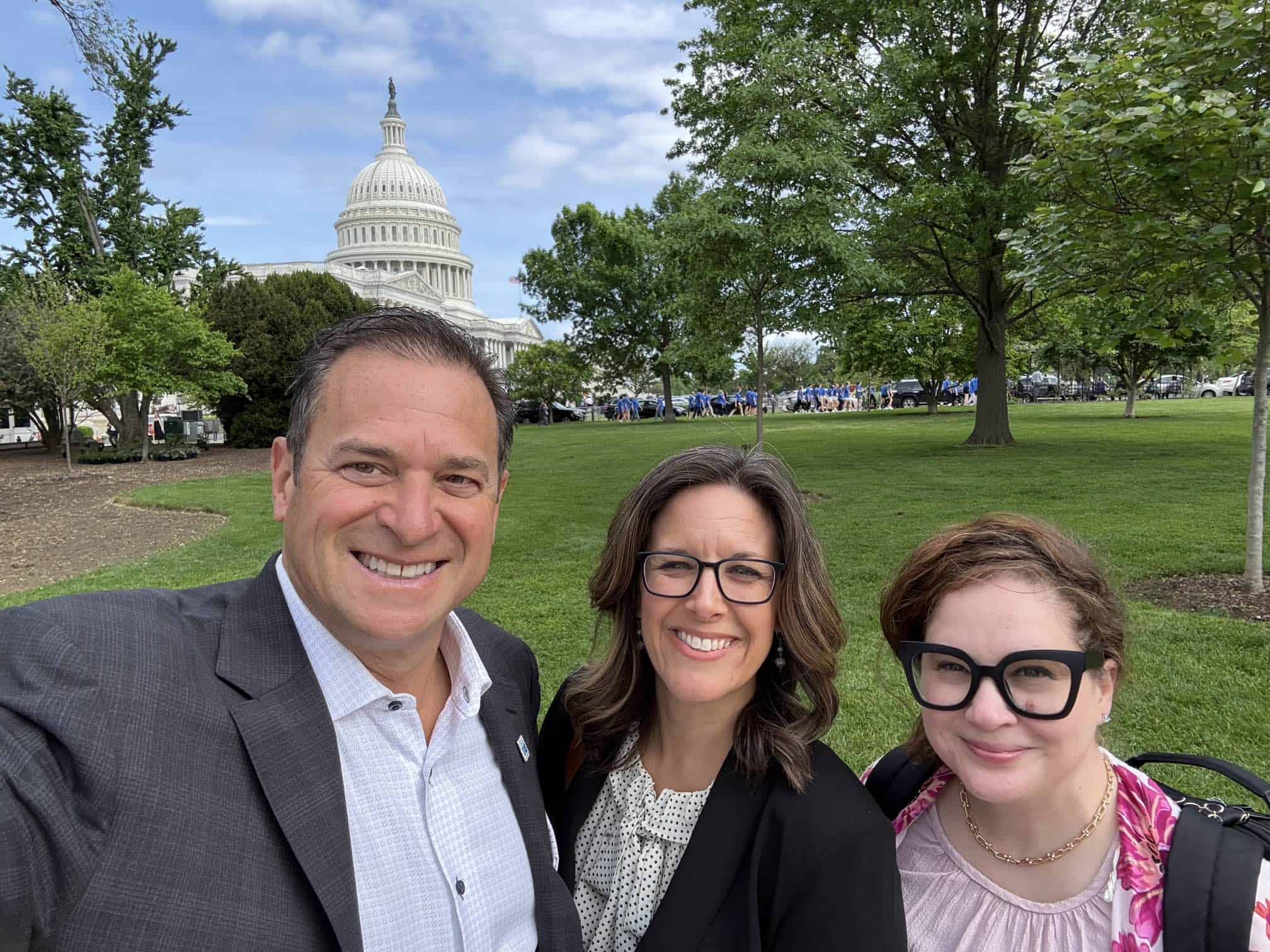 members of IHS pose outside of the US Capitol Building