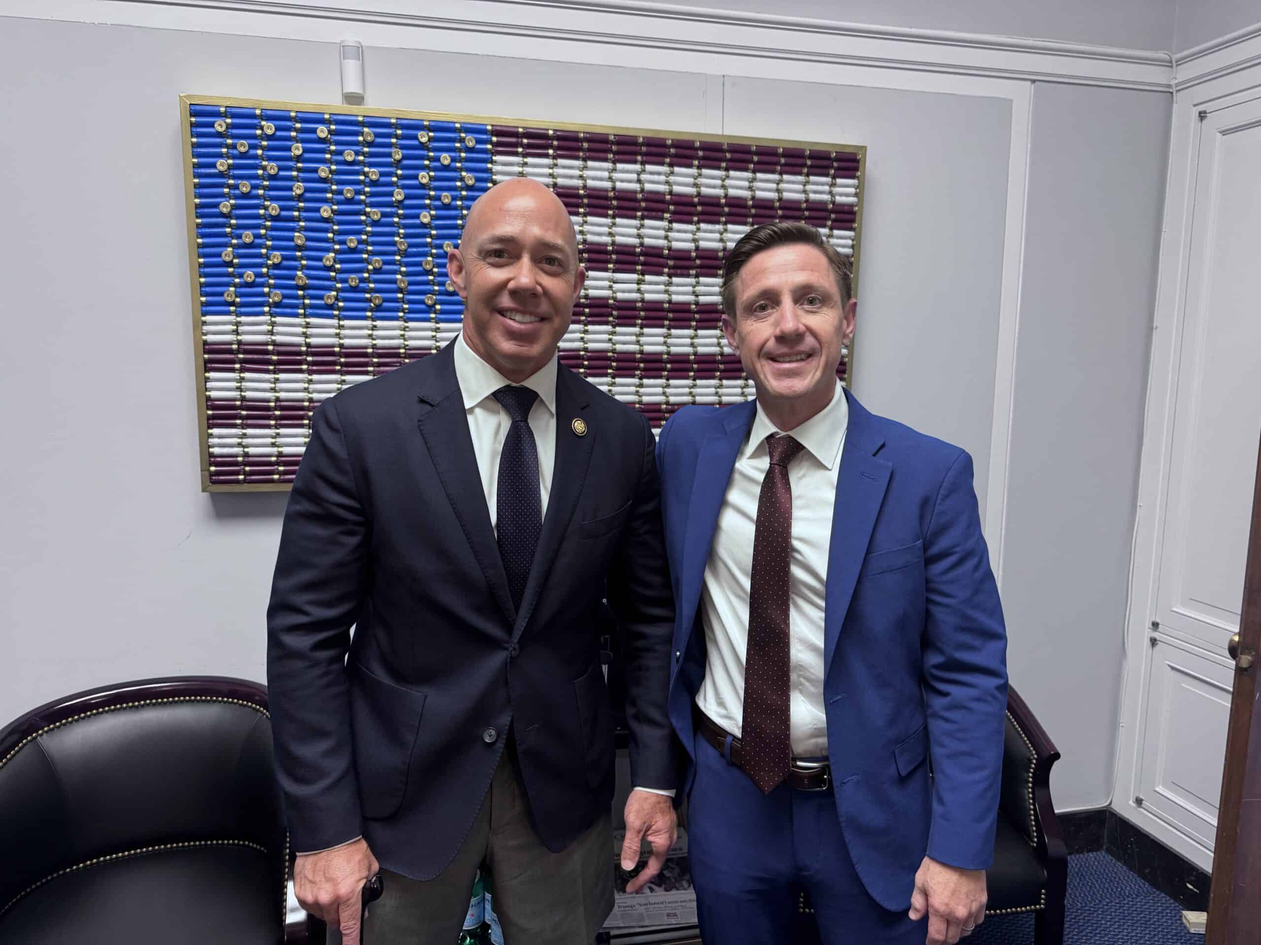 IHS member poses with US representative