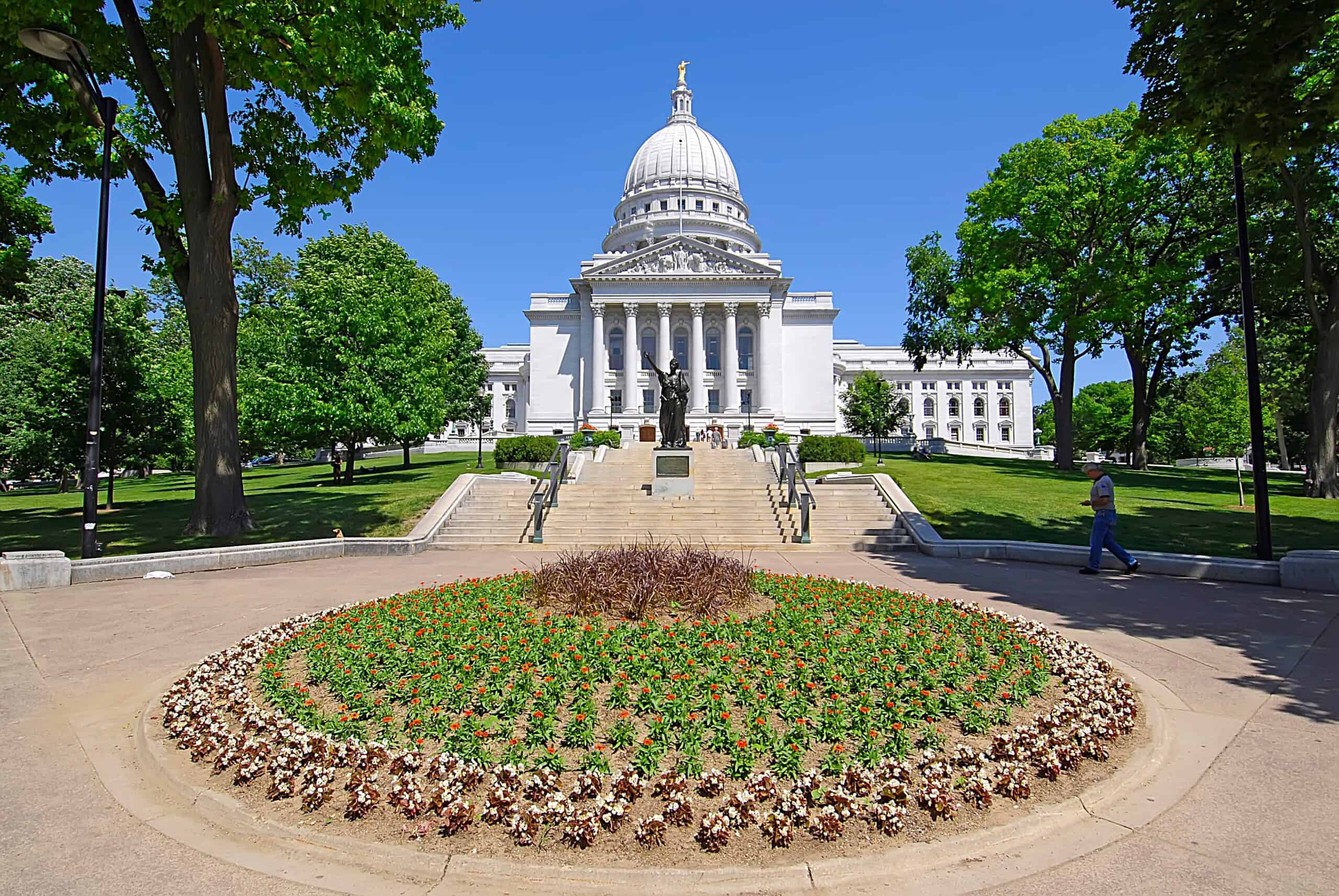 Wisconsin State Capitol building in Madison, with flower garden.